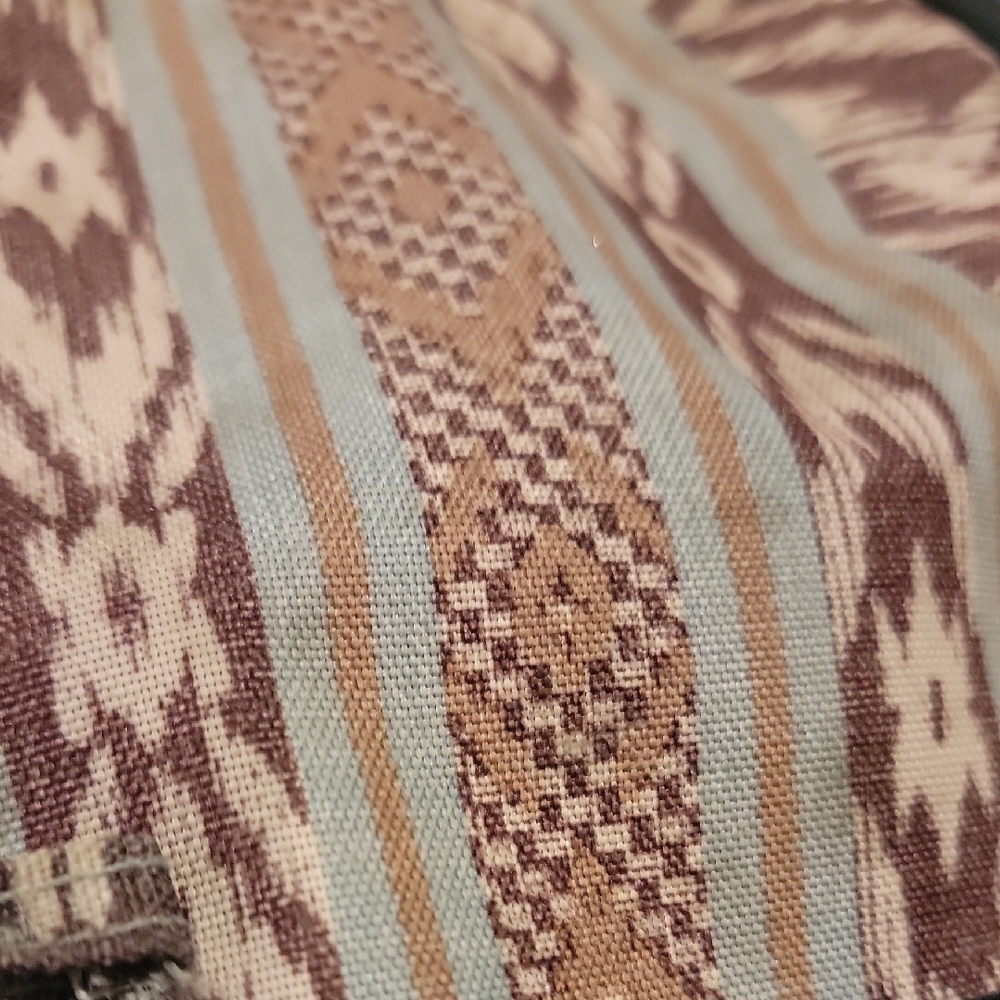 Patterned Backpack With Black Accents - image 3